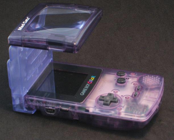 The classic purple gameboy with a led and maginifier glass
